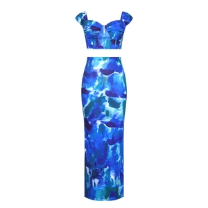 Detailed view of the marble print crop top and slim fit maxi skirt two-piece set