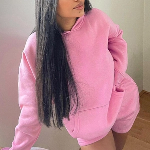 Close-up of pink long sleeve hoodie with kangaroo pocket and matching shorts set