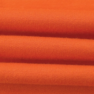Detailed macro view of vibrant orange knitted fabric texture with soft folds and weave
