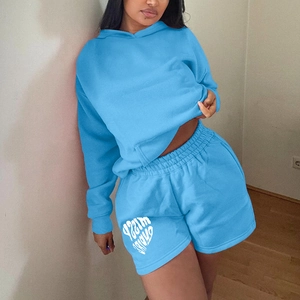 Women's bright blue long sleeve hoodie and high-waisted shorts two-piece sport set