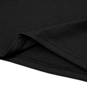 Close-up of black ribbed knit fabric showing detailed vertical texture and neat double stitching
