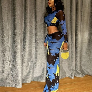 Floral print two-piece set featuring long sleeve crop top and bodycon maxi skirt