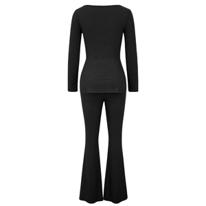 Women's black ribbed knit two-piece set featuring backless top and high-waisted flared pants