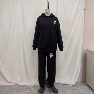 Men's black hooded sweatshirt and jogger set with white FP logo on chest and leg