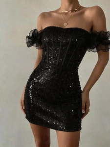 Detailed view of black sequin off-shoulder dress with corset bodice and sheer mesh sleeves