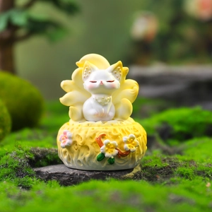 Nine-tailed fox resin figurine incense burner on mossy rock with floral base