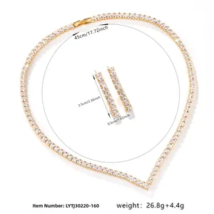 Detail showing dimensions of V-shaped gold plated jewelry set with square cut cubic zirconia