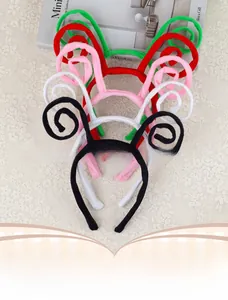 Detail of colorful Halloween headbands with double-spiral butterfly and ant antenna designs