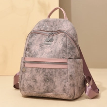 Detailed view of large capacity starry pink laptop backpack with durable straps and zips