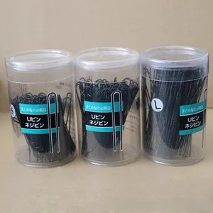 Three sizes of black U-shaped wavy hairpins set in transparent cylindrical storage containers