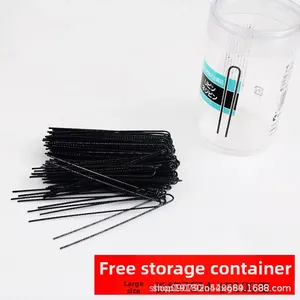 Detailed view of 7cm black U-shaped hair pins set in a transparent storage tub