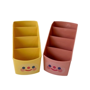 Minimalist multi-tier desktop stationery organizer with cute smile design in yellow and pink