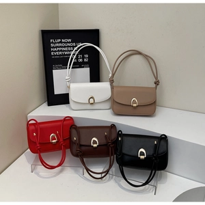 Collection of modern solid color shoulder bags with elegant horseshoe metal buckles