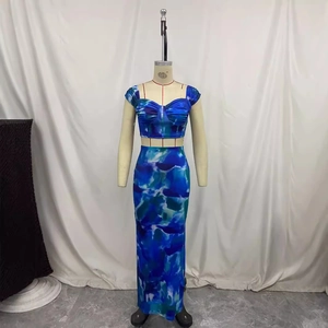 Blue marble print two-piece set featuring a cropped top and high waist long skirt