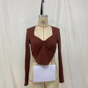 Brown long sleeve crop top with sweetheart neckline and ruched twist front knit fabric