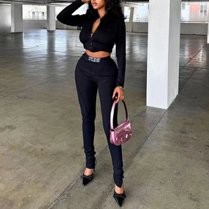 Women's 2-piece black knitted track set with slim fit zip-up top and high waist leggings