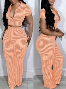 Damen zweiteiler set in orange mit reißverschluss oberteil und cargo hose mit weitem bein