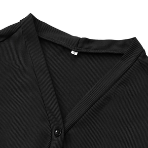 Close-up of V-neckline on black ribbed knit dress with single button and size S label
