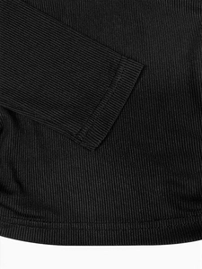 Top corto a maniche lunghe in maglia a costine nera con cuciture di qualità