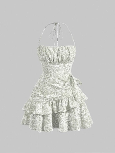 Floral print halter tiered dress with a vintage cream finish and double-layered ruffle hem