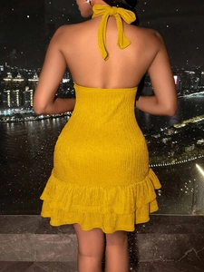 Chic ginger halter neck backless mini dress with ribbed texture and ruffled hemline