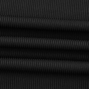 Close-up of black ribbed knit fabric showing high-density vertical texture and elasticity