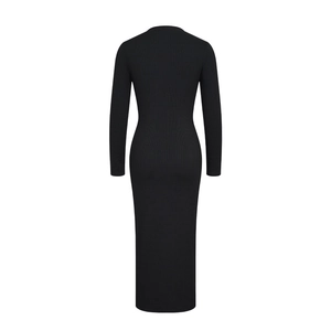 Detail view of black knit maxi dress featuring vertical ribbed texture and slim fit design