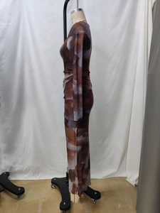 Detail view of long sleeve bodycon dress with brown marble print in mesh fabric