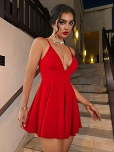 Elegant red deep V-neck mini dress with spaghetti straps and A-line pleated skirt for parties