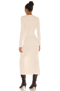 Back view of a cream knit long-sleeve slim fit maxi dress with vertical ribbed texture