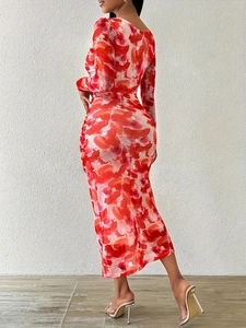Elegant floral print maxi dress featuring long sleeves and flattering ruched details