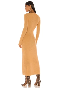 Slim fit camel knit maxi dress with long sleeves and ribbed texture on female model