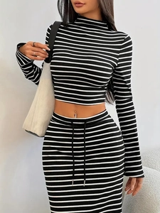 Women striped two-piece set featuring high neck long sleeve crop top and long skirt