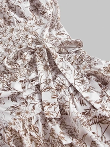 Floral spaghetti strap dress with layered ruffle hem and bow detail in vintage floral print