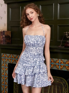 Blue floral halter mini dress with tiered ruffle hem and drawstring waist for summer
