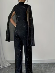Elegant black sequin jumpsuit with lantern sleeves and star-patterned sheer cape back view