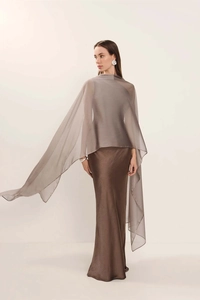 Detail view of elegant pleated taupe chiffon cape paired with smooth satin long dress
