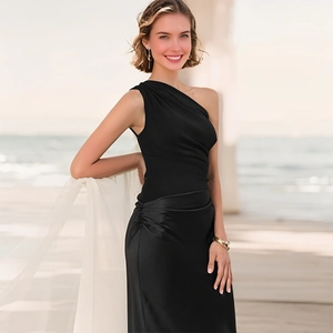 Detail of elegant black one-shoulder dress featuring asymmetrical waist pleats and slim fit