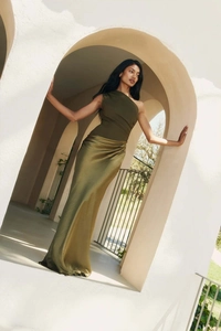 Detail of olive green satin dress featuring asymmetrical shoulder and elegant draping