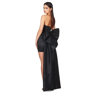 Elegant black strapless mini dress with a large bow and long trail on the back