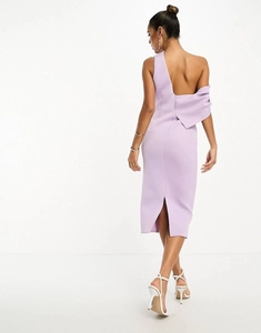 Detail of light purple one-shoulder dress showing the slim fit back and slit hem design