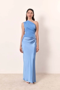 Detailed view of the light blue one-shoulder satin dress with elegant pleated bodice