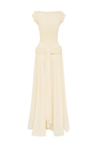 Detail of elegant off-shoulder ivory lace bodice and pleated chiffon skirt on dress