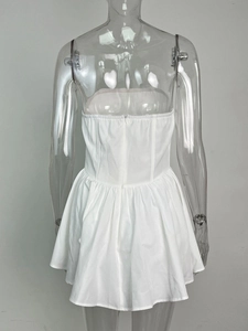 Detailed back view of white strapless corset dress with invisible zipper and flared skirt