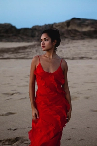 Detailed ruffled chiffon texture and V-neck of a red slim fit backless maxi dress