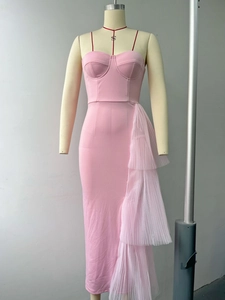 Detail of pink bustier evening dress featuring pleated mesh side slit and slim silhouette