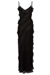Detail of layered ruffles on a backless black chiffon dress with thin straps
