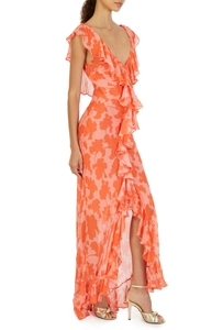 Detail view of V-neck ruffled floral chiffon maxi dress with high side slit in orange