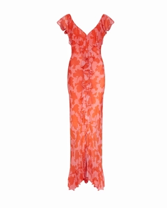 Macro detail of red floral chiffon dress showing ruffle trim and sheer fabric texture
