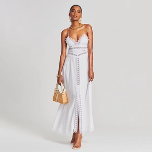 Elegant white lace cutout maxi dress for summer vacations with open back tie design